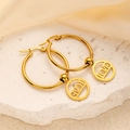 Gold plated titanium steel hoop earrings with circular LOVE engraved charm pendants - LOVE Letter Hoop Style (0424)