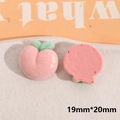 Macro detail of flocked peach resin charm for DIY hair clips and phone case decor - Pink Peach