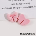 Macro shot of pink flocked bow DIY accessory showing front and back with 16mm x 20mm size - Light Pink Bow