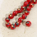 Close-up of 12mm red hand-painted ceramic beads with floral glaze for DIY jewelry - 9# Red Butterfly Bead / 12mm (1 Piece)
