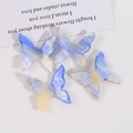 Macro detail of gradient blue and yellow acrylic resin butterfly charms for DIY crafts - Large / Blue-Yellow