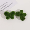 Close-up of green flocked butterfly hair accessories with golden metal clips on back - Horizontal Hole Patch / Green