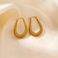U-shaped gold wing earrings with detailed textured wire wrapping and a sleek finish - Teardrop Thread Wrapped Hoop Earrings (0088) / Gold