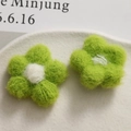 Handmade knitted puff flower accessory in bright green and white for DIY crafts - Green
