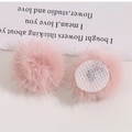 Detailed view of 3cm pink mink fur pompom with a white circular base for DIY crafts - Peach Pink