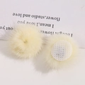 Detailed view of fluffy 3cm light yellow mink fur balls with circular mesh magnetic base - Light Yellow