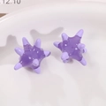 Macro shot of purple star-shaped acrylic earring components in a white ceramic dish - Sea Urchin Shape (B02-4-39-43) / Purple