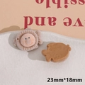 Close-up of flocking fish DIY charms showing front face and flat back surface - Fish and Bear