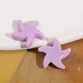 Dettaglio di ciondoli a stella marina in resina viola lucida per gioielli fai-da-te - Viola
