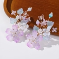 Dettaglio accessorio per capelli con fiori viola in resina e elementi in filo dorato - Viola Chiaro