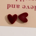 Dettaglio di ciondoli a cuore floccati rossi per gioielli fai-da-te e cover per cellulari - Rosso