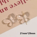 Macro detail of transparent acrylic butterfly pendant charms for DIY jewelry 21x29mm - Transparent Perforated Butterfly Style (B56-1-15-17)