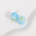 Close-up of light blue resin tulip flower bead with gold glitter for DIY jewelry making - 1 Piece / Sky Blue
