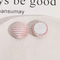 Close-up of pink striped fabric-covered round metal buttons for DIY accessory design - Light Pink