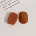 Flat oval resin accessories in caramel amber finish for DIY jewelry and hair clips - Brown