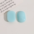 Detail of light blue oval resin cabochons for DIY jewelry and hair accessories - Light Blue
