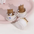 Detailed view of three mini resin shiba inu dog charms in white coffee cups figurines - White Coffee