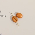 Macro-opname van acryl koffieboon kralen met gouden textuur voor DIY sieraden maken - 1 stuk/verpakking (11x9mm) / Oranje