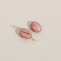 Detail van lichtroze koffieboon kralen met goudmarmeren textuur voor DIY-sieraden maken - 1 stuk/verpakking (11x9mm) / Roze