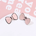 Dettaglio di accessori a fiocco 3D in acetato rosa con bordo nero per gioielli fai da te - Rosa