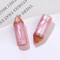 Macro shot of pink pearlescent pencil resin charms for DIY jewelry and accessories - Pink