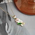 Collana vintage in oro con pendente floreale ovale smaltato e dettaglio in perla bianca - Collana con Pendente Giglio Quadrato / Bianco