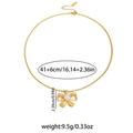 Dettaglio del ciondolo a fiocco dorato con perla su catena in acciaio 41cm - Collana Pendentivo Perla Fiocco (TYN0514)