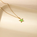 Detail van zeester hanger met groen emaille en goudkleurige O-ketting halsketting - Groene Zeester