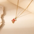 Detailed close-up of a festive Christmas stocking pendant necklace in gold finish - Star Christmas Sock Pendant Necklace