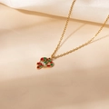 Close-up of golden Christmas candy cane necklace with red green enamel and bow detail - Heart Candy Cane Style (0757)