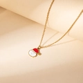 Close-up of golden Christmas necklace with red and white enamel Santa Claus pendant - Red Hat Santa Claus Style (0760)