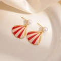 Elegant gold shell earrings with red enamel stripes and pearl studs on white silk - Red And White Pattern (TYE1637)