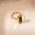 Detail of emerald cut green gemstone on a vintage style golden adjustable ring - Emerald Green Rectangle Ring