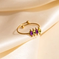 Gold open ring with four marquise-cut purple and green zircons on beige satin - Multi-Color Band Style (1669)