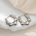 Elegant silver stainless steel hoop earrings with linked 3D heart-shaped design - Multiple Hearts Hoop Earrings 0191