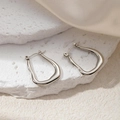 Minimalist silver irregular wavy hoop earrings with a polished metallic finish - Irregular U-Shape Earrings 0212