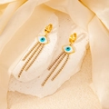 Gold-plated wing earrings featuring blue evil eye charms and long rhinestone tassels - Long Evil Eye Rhinestone Tassel (0512)