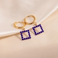 Boucles d'oreilles créoles dorées avec pendentifs carrés ornés de zircons bleus brillants - Boucles d'Oreilles Zirconia Bleu Carré Creux