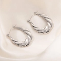 Elegant silver twisted hoop earrings with polished spiral design and secure snap closure - Twisted Braid Hoop Earrings 0227