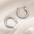Pair of silver stainless steel hoop earrings with textured geometric honeycomb relief - Round Honeycomb Pattern Hoop Earrings 0232