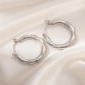 Polished silver stainless steel hoop earrings featuring a unique bamboo texture design - Round Twisted Rope Hoop Earrings 0236