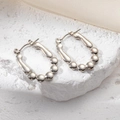 Minimalist silver stainless steel hoop earrings featuring a row of six metal beads - Irregular Round Bead Earrings 0203
