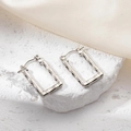 Silver rectangular bamboo joint earrings with minimalist metal texture on marble - Square Bamboo Joint Earrings Silver 0204