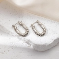 Silver oval hoop earrings featuring a unique braided and polished metal texture - Twist Rope Earrings 0206