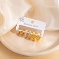 6-piece gold stainless steel geometric hoop earring set with polished and crystal finish - EXRGE1721