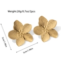 Detailed view of gold flower earrings showing radial brushed texture and metallic luster - Exquisite Petal Earrings (JDE2502029)
