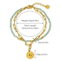 Detail view of double-layer titanium gold chain with green natural stone and logo tag - Light Green Beaded Emerald Pendant (Bohemian Style 06)