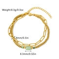 Detailed view of double-layer gold paperclip chain and green stone bracelet charms - Square Green Stone and Bead Chain Style (Bracelet 05)