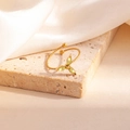 Bague torsadée dorée ornée de trois pierres marquises vertes en forme de trèfle - Style Trèfle Jaune