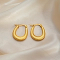 U-shaped gold twist earrings with spiral texture on elegant champagne silk fabric - Diagonal Teardrop Earrings 0176